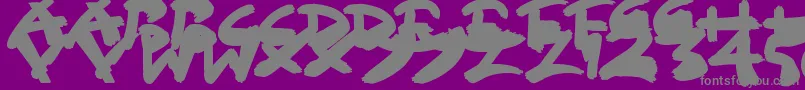 SloppyPaint-fontti – harmaat kirjasimet violetilla taustalla