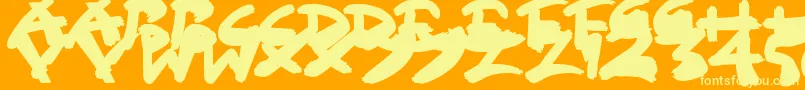 SloppyPaint-fontti – keltaiset fontit oranssilla taustalla