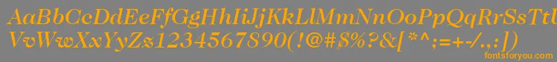 フォントItcCaslon224LtMediumItalic – オレンジの文字は灰色の背景にあります。