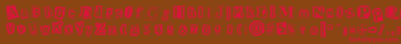 CutNPasteRegular Font – Red Fonts on Brown Background