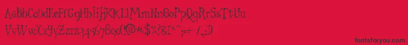 フォントStructdestructSerif32 – 赤い背景に黒い文字