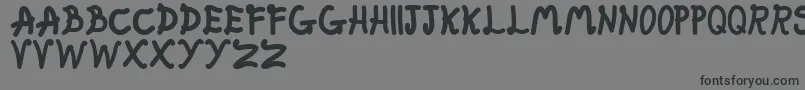 FatFairy Font – Black Fonts on Gray Background