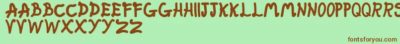 FatFairy Font – Brown Fonts on Green Background