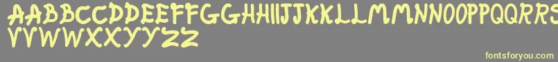 FatFairy Font – Yellow Fonts on Gray Background