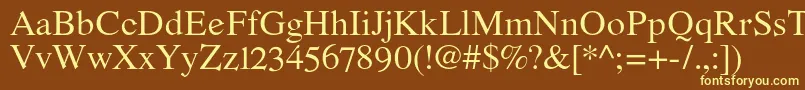 RomandeadfstdRegular-fontti – keltaiset fontit ruskealla taustalla