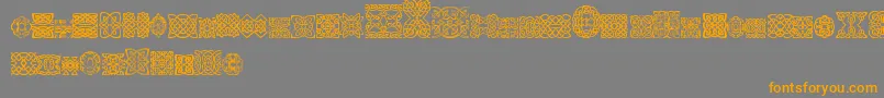 フォントSlCelticStyle – オレンジの文字は灰色の背景にあります。