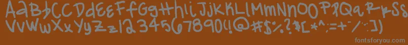Franciie-Schriftart – Graue Schriften auf braunem Hintergrund