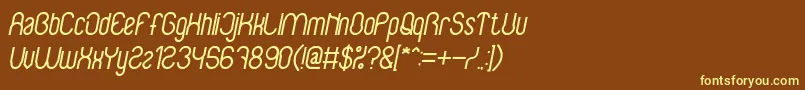 BabysuperheroItalic-fontti – keltaiset fontit ruskealla taustalla