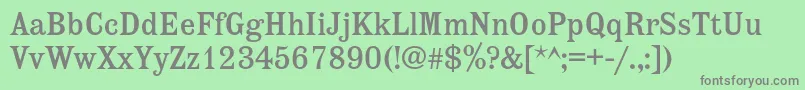 フォントEtiennec – 緑の背景に灰色の文字