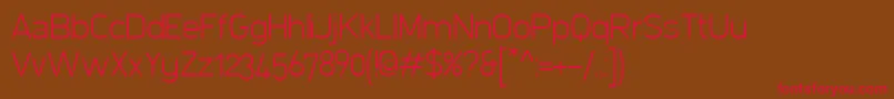 FilettoExtralight Font – Red Fonts on Brown Background