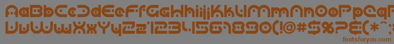 フォントSfplanetaryorbiter – 茶色の文字が灰色の背景にあります。