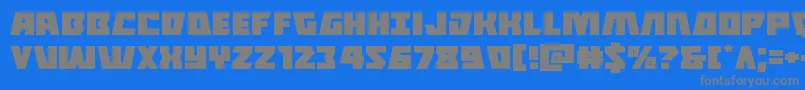 フォントHalfshellheroexpand – 青い背景に灰色の文字