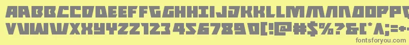 フォントHalfshellheroexpand – 黄色の背景に灰色の文字