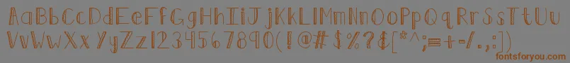 Kbruffledfeathers Font – Brown Fonts on Gray Background