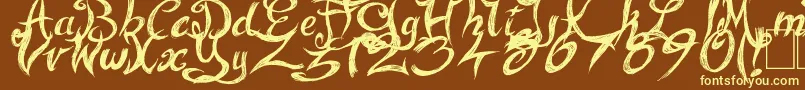 FairyStrange-fontti – keltaiset fontit ruskealla taustalla