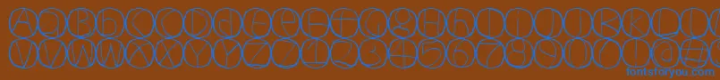 フォントCirculum – 茶色の背景に青い文字