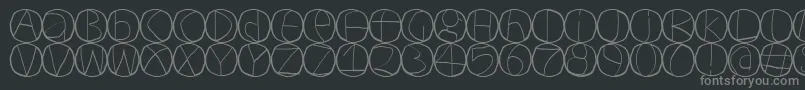 Circulum-fontti – harmaat kirjasimet mustalla taustalla
