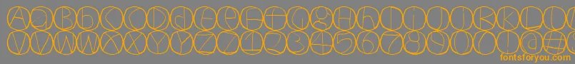 フォントCirculum – オレンジの文字は灰色の背景にあります。