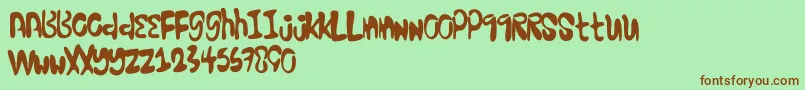 Excellentstencil Font – Brown Fonts on Green Background