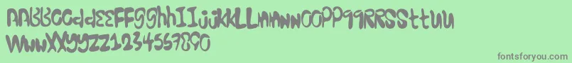 Excellentstencil Font – Gray Fonts on Green Background