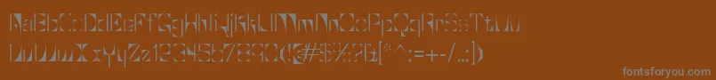 Glaukous-fontti – harmaat kirjasimet ruskealla taustalla