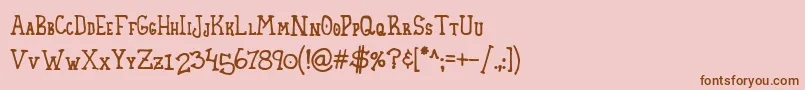 フォントHomespunSmallCaps – ピンクの背景に茶色のフォント