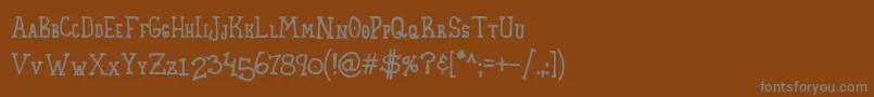 フォントHomespunSmallCaps – 茶色の背景に灰色の文字