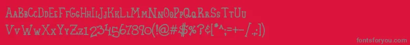 フォントHomespunSmallCaps – 赤い背景に灰色の文字