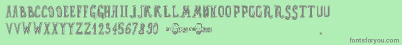 Czcionka GynToons – szare czcionki na zielonym tle