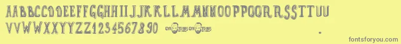 GynToons Font – Gray Fonts on Yellow Background