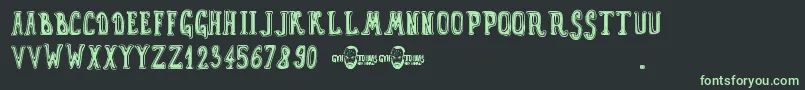 GynToons Font – Green Fonts on Black Background