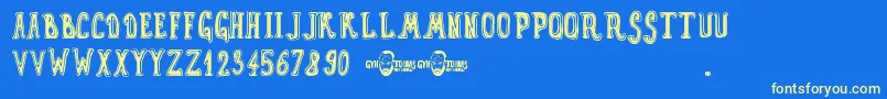 GynToons Font – Yellow Fonts on Blue Background