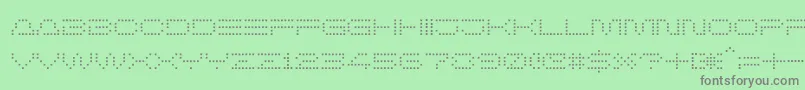 Herobule-Schriftart – Graue Schriften auf grünem Hintergrund