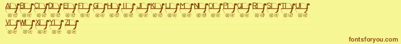 LmsRykersPram Font – Brown Fonts on Yellow Background