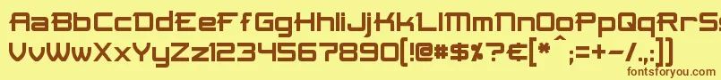 フォントSkir – 茶色の文字が黄色の背景にあります。