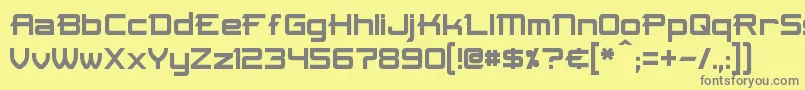 フォントSkir – 黄色の背景に灰色の文字