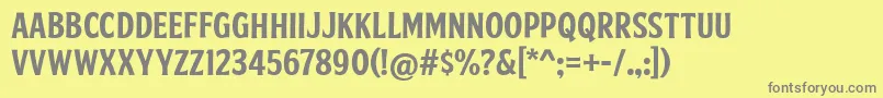 FtySkradjhuwnNcv1-fontti – harmaat kirjasimet keltaisella taustalla