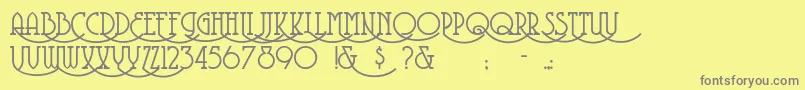 Coventrygarden-fontti – harmaat kirjasimet keltaisella taustalla
