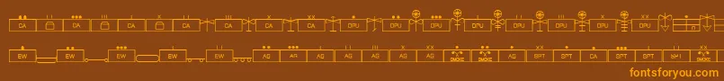 フォントEsriMilsym04 – オレンジ色の文字が茶色の背景にあります。