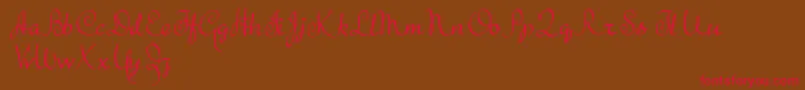 TheBeatGoesOn Font – Red Fonts on Brown Background