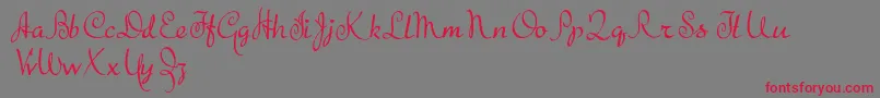 TheBeatGoesOn-Schriftart – Rote Schriften auf grauem Hintergrund