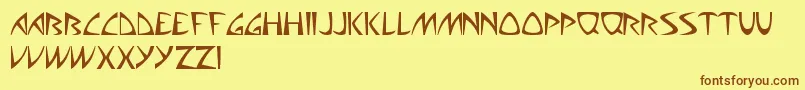 AliensCanSuckIt Font – Brown Fonts on Yellow Background