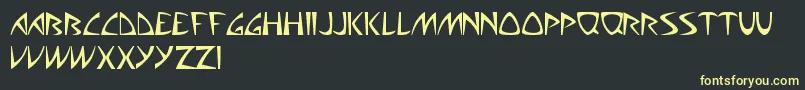 AliensCanSuckIt-Schriftart – Gelbe Schriften auf schwarzem Hintergrund