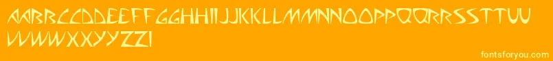 フォントAliensCanSuckIt – オレンジの背景に黄色の文字