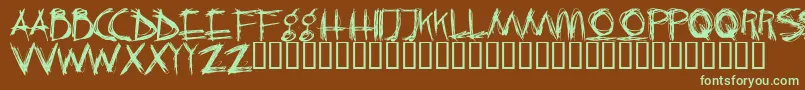 フォントCrazyKiller – 緑色の文字が茶色の背景にあります。