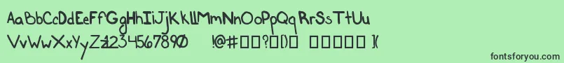HandbagRegular-fontti – mustat fontit vihreällä taustalla