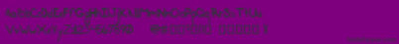 HandbagRegular Font – Black Fonts on Purple Background