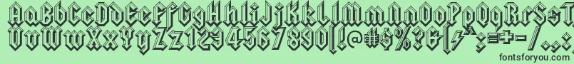 Czcionka Squealerembossed – czarne czcionki na zielonym tle
