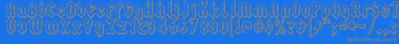 Squealerembossed-fontti – harmaat kirjasimet sinisellä taustalla