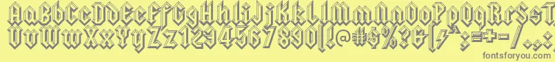 Squealerembossed-Schriftart – Graue Schriften auf gelbem Hintergrund